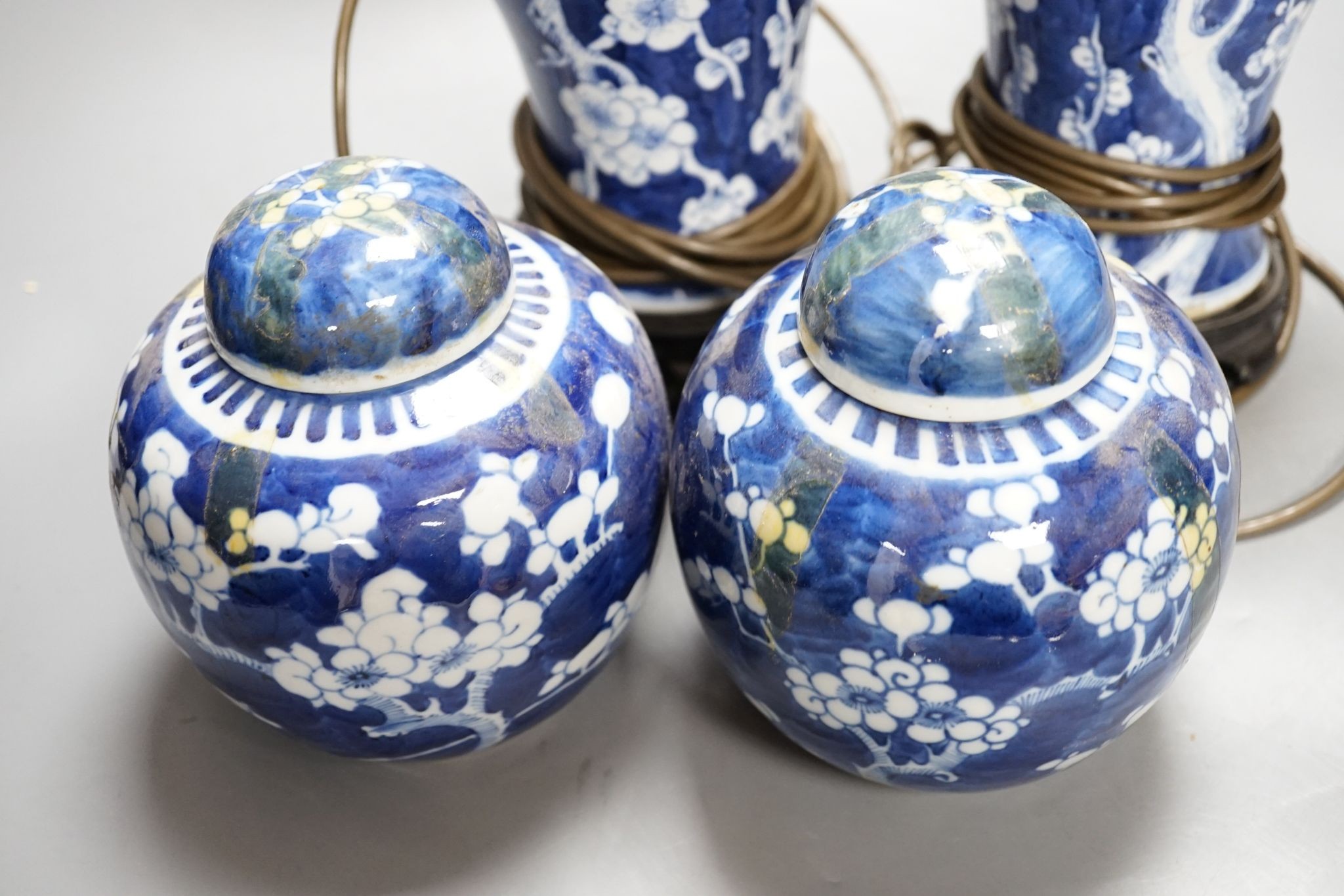 A pair of Chinese blue and white lamps and pair of ginger jars